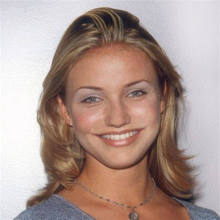 Delaina Mitchell with a brown hair poses at the camera.
