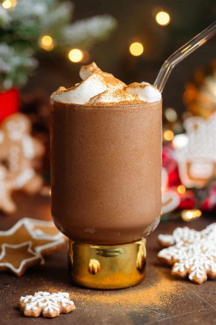 Gingerbread smoothie topped with whipped cream.