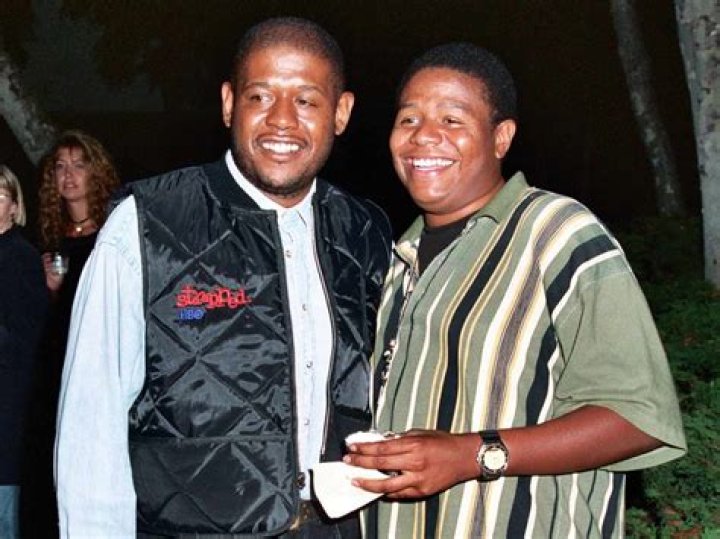 Kenn Whitaker with brother Forest Whitaker and his award.
