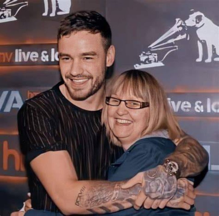 Liam Payne with his mother and sister Liam Payne with his mother and sister