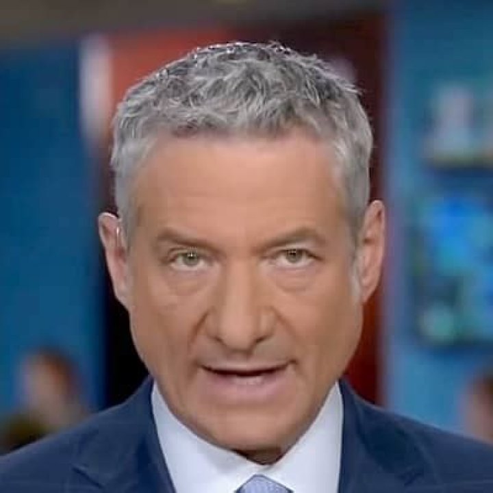Rick Leventhal's fiance Kelly Dodd kissing him on his cheeks.